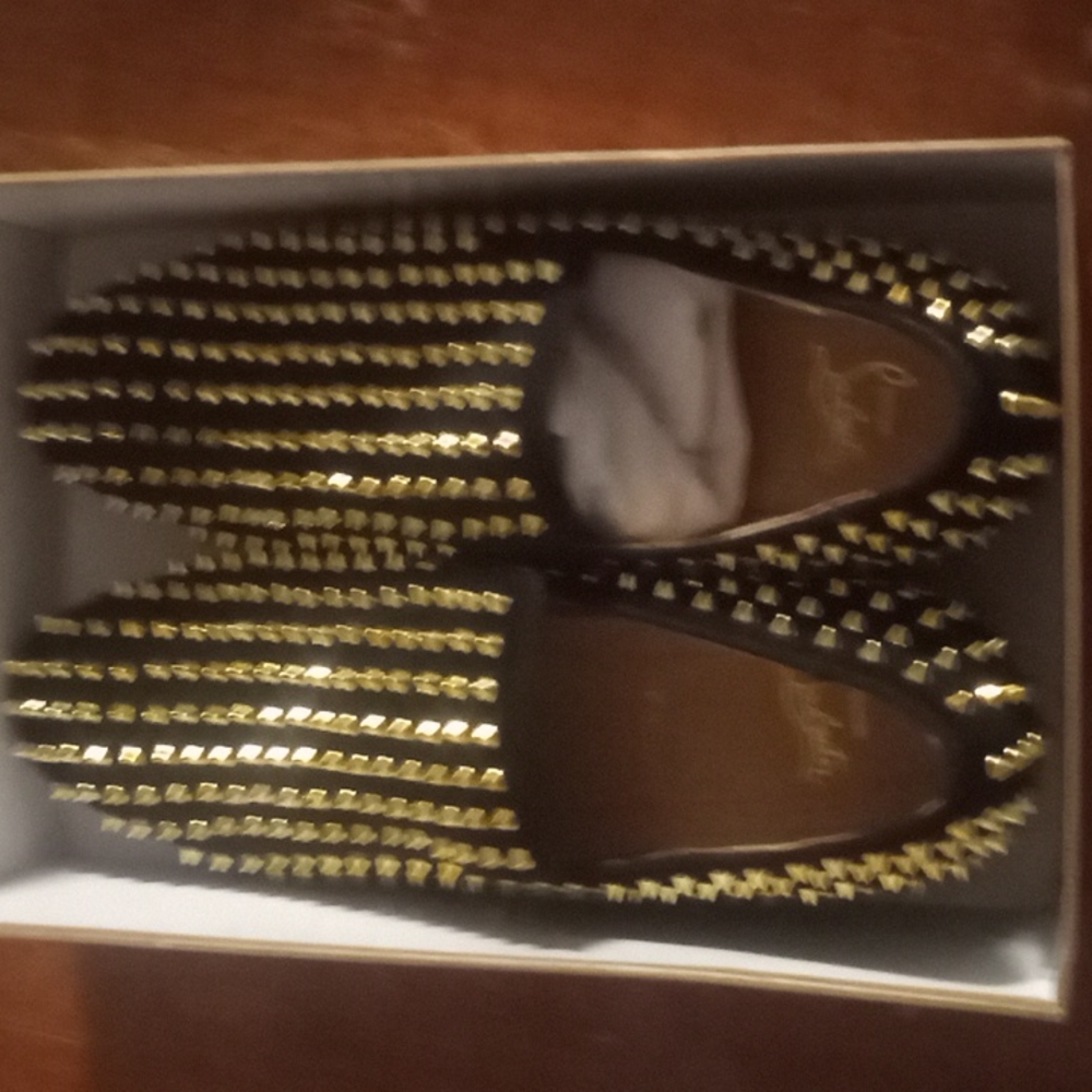 Golden Christian Louboutin dandelion spikes